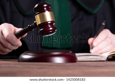 A judge ruling a court judgment