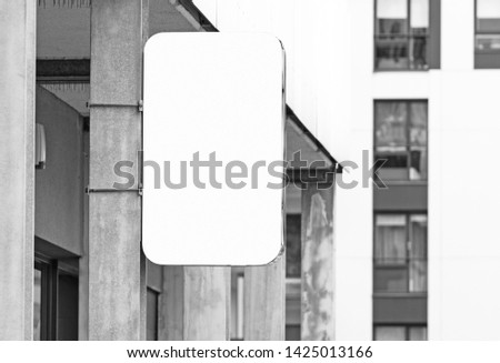 Hanging wall signboard jpeg mockup, modern style outdoor signage with copy space, company sign to add logo or text, black and white real picture 