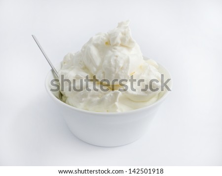 Cream in a white bowl   Royalty-Free Stock Photo #142501918