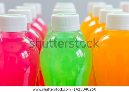 Colourful juice and Electrolyte drink in bottle for healthy and sport man and Athlete