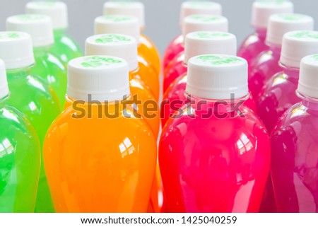 Colourful juice and Electrolyte drink in bottle for healthy and sport man and Athlete