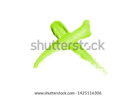 Bright liquid lipstick smear in the form of a check mark isolated on a white background. Cosmetic product stroke. Yes sign for checkbox. Light green color