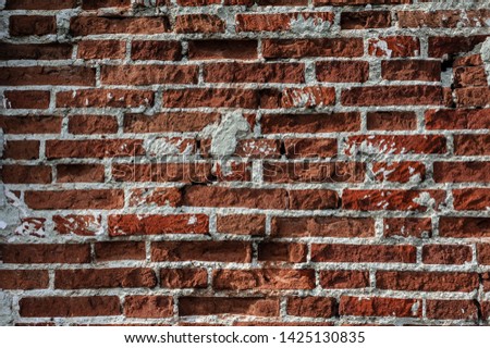 brick wall with white putty destroyed background for text and design