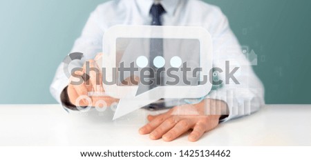 View of a Businessman holding a message icon with data in background - 3d rendering