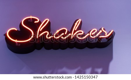 Neon signboard to signal restaurant. Shakes