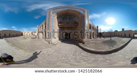 The 360 degrees picture of the Olloqulixon medrese in Khiva, Uzbekistan. 360 panorama pictures.