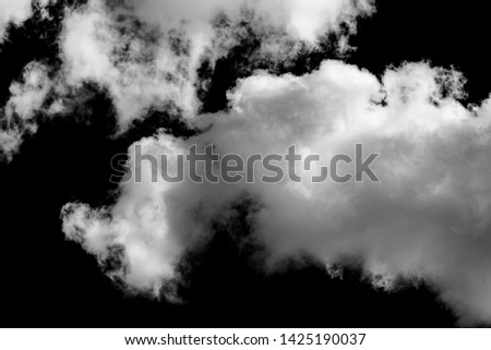 White cloud isolated on a black background realistic cloud. white fluffy cumulus cloud isolated cutout on black background