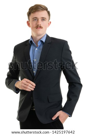 Happy young businessman in suit looking at camera on white background, isolated concept