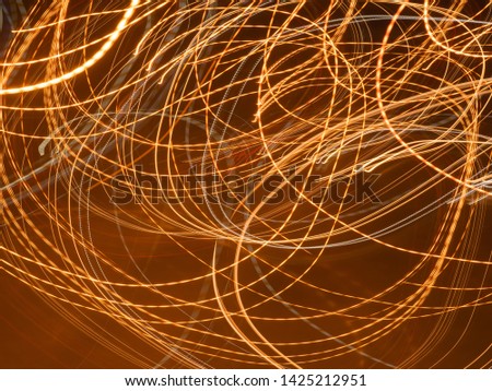 Beautiful blurred images of car lights with different characteristics that run on highway roads at night with speed. Long exposure photography techniques.