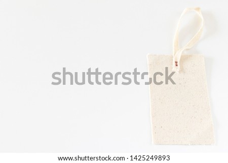 Tags made of white cloth