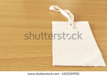 Tags made of white cloth