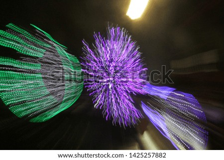  image of colorful light trails with motion blur effect, long time exposure. Isolated on background
