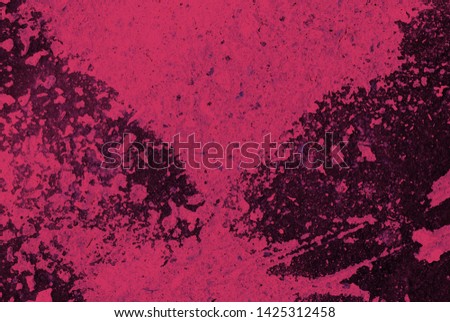 Toned asphalt surface with paint on it close up. Abstract background