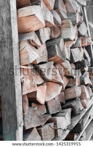 Chopped wooden logs. Background of firewood