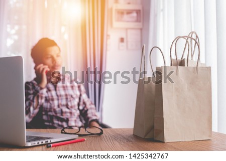 businesswoman using phone for shopping online.