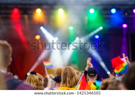 Music Event on PRIDE Festival with colourful flags and spotlights, LGBT Royalty-Free Stock Photo #1425346505
