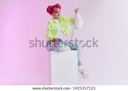 woman with a pink hair bag