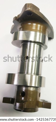 NEW TWO WHEELER CAMSHAFT BS6 ISOLATED ON WHITE BACKGROUND. INDUSTRIAL CONCEPT,SERVICE CONCEPT, INDUSTRIAL METALWORKING CONCEPT