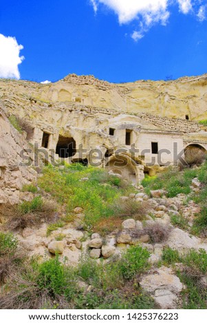 Photo taken in Turkey. The picture shows the ancient ruins of the cave city in Cappadocia.
