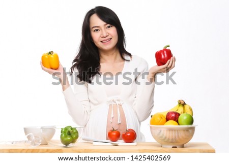 Belly woman prepare vegetable salad healthy food - Concept on the white background.