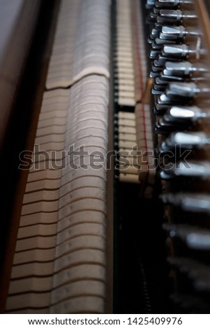 Close up of the inside of a piano