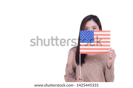 Woman standing in front view of the eye show and using the USA flag off half face with white background. Space for Text. 4th of July. Celebrate American National Day. Labor Day. Independence Day