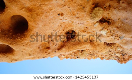 Sandy hill with holes background