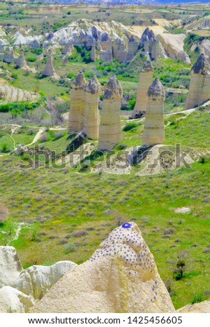 Photo taken in Turkey. The picture shows the valley of love with its unusual-shaped rocks in the highlands - Cappadocia.
