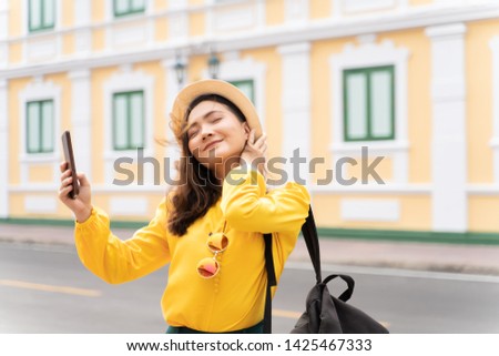 Happy woman take a selfie on vacation time