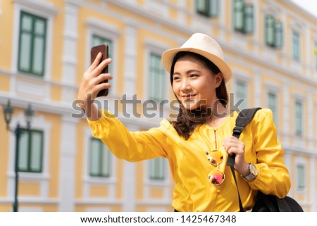 Happy woman take a selfie on vacation time