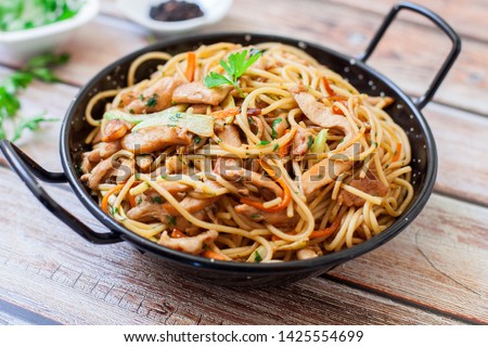 chinese style chicken fried noodles with veggies Royalty-Free Stock Photo #1425554699