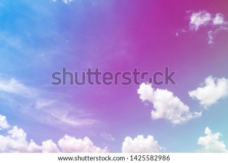 Abstract surreal nature background of Colorful pastel gradient sky with fantasy bright puffy & fluffy white clouds, dreamy artistic art & freedom concept for wallpaper, banner, backdrop, copy space