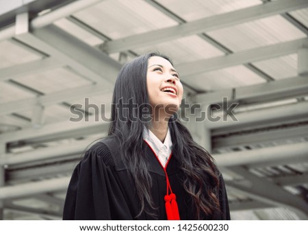 Beautiful Asia girl students are happy after graduation.