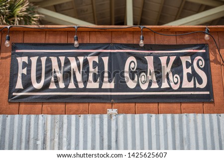 Funnel Cakes sign on the beach boardwalk