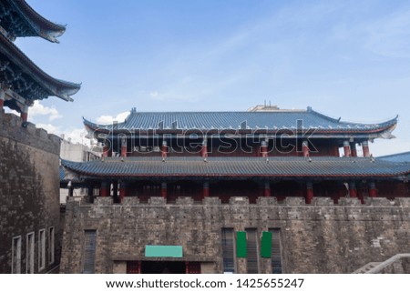 Traditional Chinese tower on city wall.
