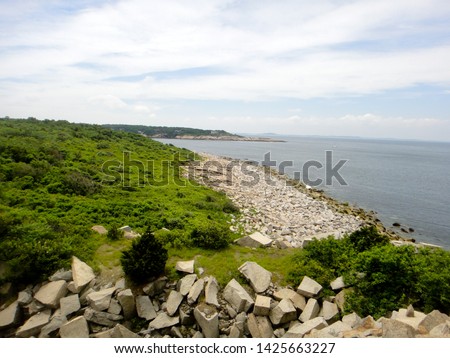 The rocky Atlantic coastline of Halibut Point State Park in Rockport, Massachusetts