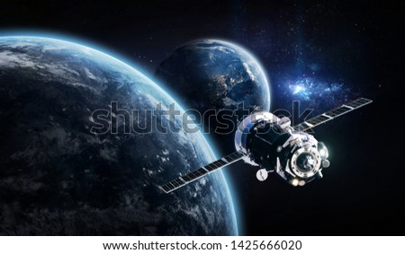 Earth and other planet with space ship in the solar system. Technology and civilization. Colonization. Elements of this image furnished by NASA