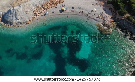 Aerial photo of tropical Caribbean bay with white sand beach and beautiful turquoise and sapphire clear sea