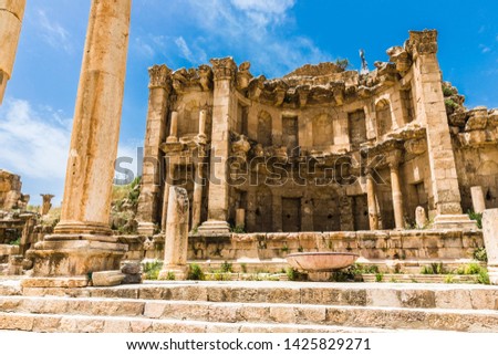 The ruins of Jerash in Jordan are the best preserved city of the early Greco-Roman era, it is the largest acropolis of East Asia. The Colonnaded Street Royalty-Free Stock Photo #1425829271