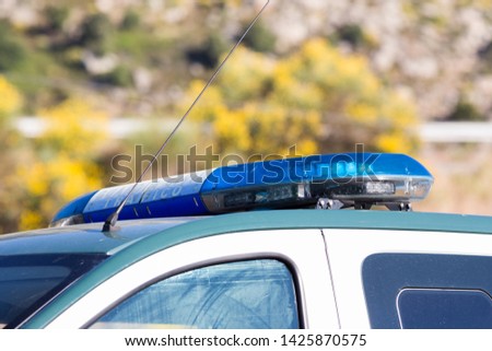 Emergency lights of a police car of the Civil Guard in Madrid, Spain.