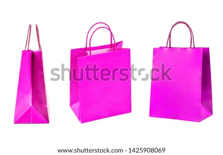 Set of pink paper bags isolated on white background.