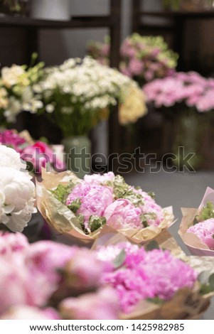 Small family business. The flowers in the refrigerator of flower shop. Profession florist. Summer bouquet. Flowers delivery