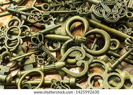 The old vintage keys gold texture on copper coin  abstract background.
