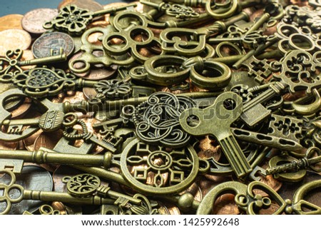 The old vintage keys gold texture on copper coin  abstract background.