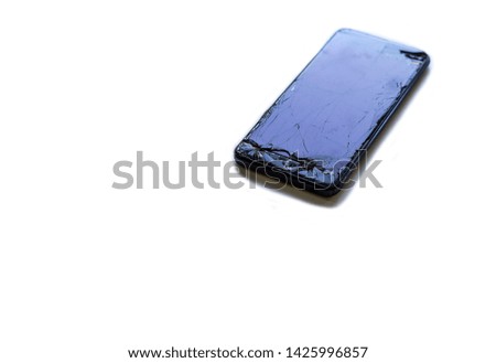 Smartphone with broken glass. Isolated. White background.