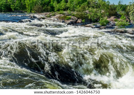 Landscape picture of Burleigh Falls in Selwyn Ontario Canada featuring high level water rapids