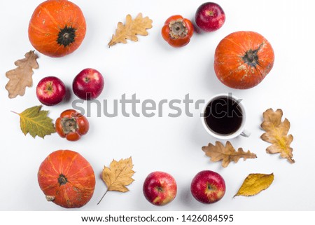 Autumn composition. Fall, autumn, halloween concept. Pumpkins, apples, persimmons and dried autumn leaves on white background. Flat lay, top view, copy space