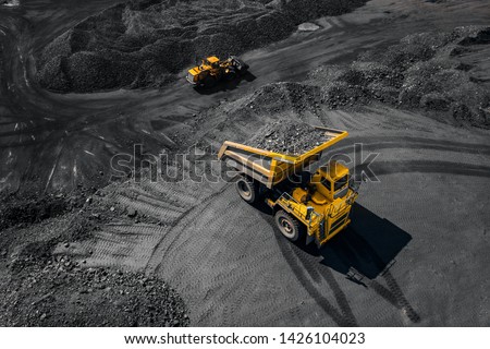 Open pit mine, extractive industry for coal, top view aerial. Royalty-Free Stock Photo #1426104023