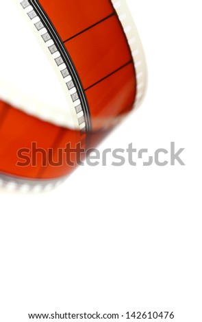 Detail of a red movie film isolated on white