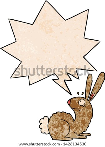 cartoon startled bunny rabbit with speech bubble in retro texture style